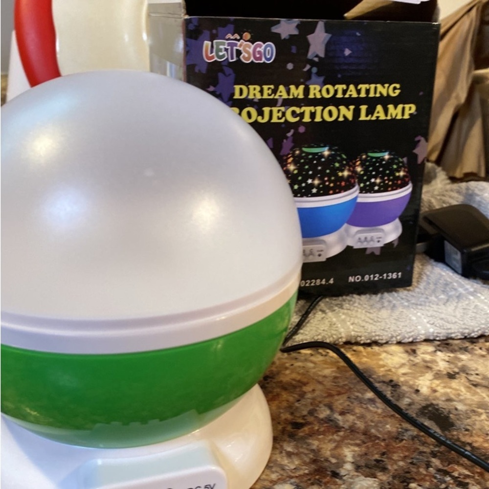 Rotating lamp for kids room